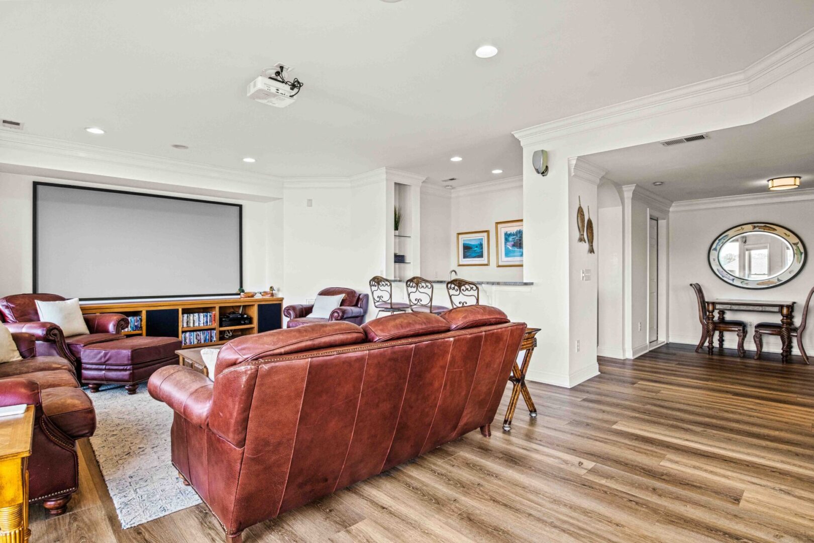 A living room with a couch and a television.