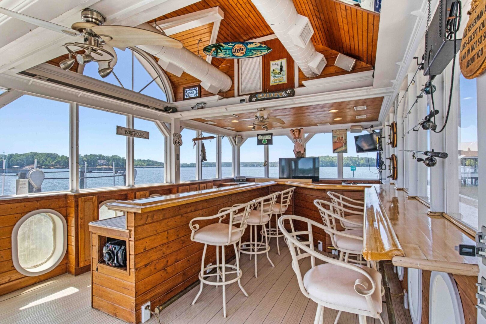 A bar with chairs and tables in it