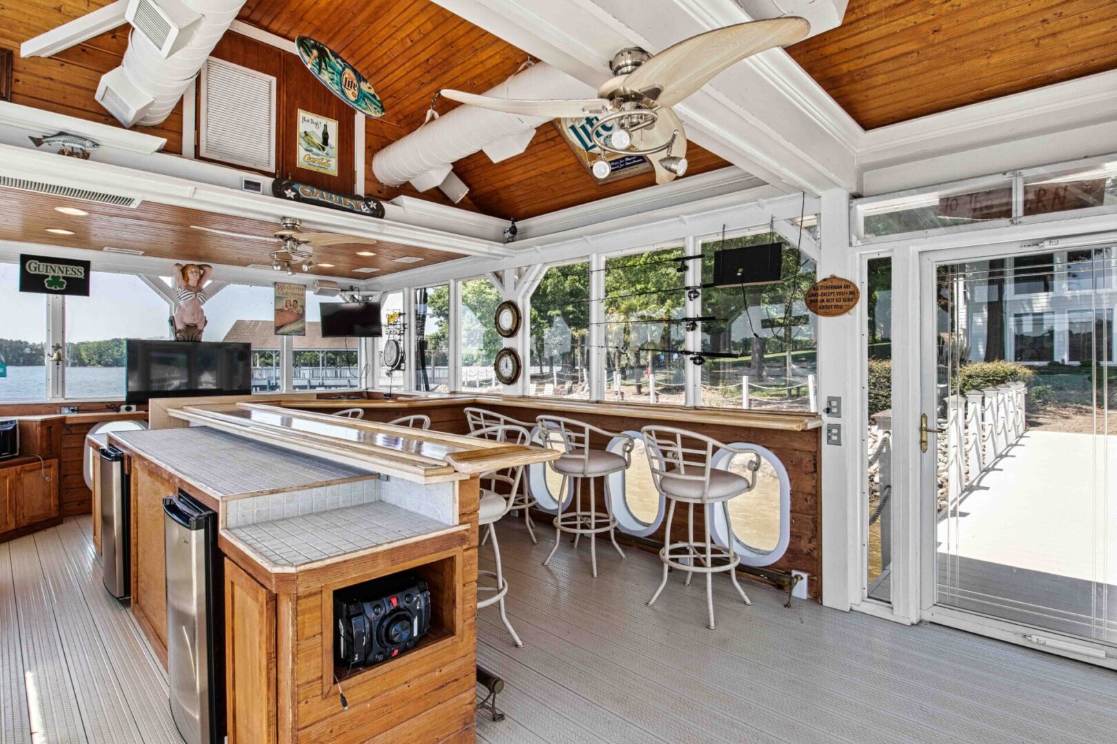 A restaurant with many tables and chairs in it